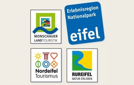 Das Bild zeigt das Logo der Erlebnisregion Nationalpark Eifel, bestehend aus den jeweiligen Logos der Touristischen Arbeitsgemeinschaften Monschauer Land, Nordeifel und Rureifel.